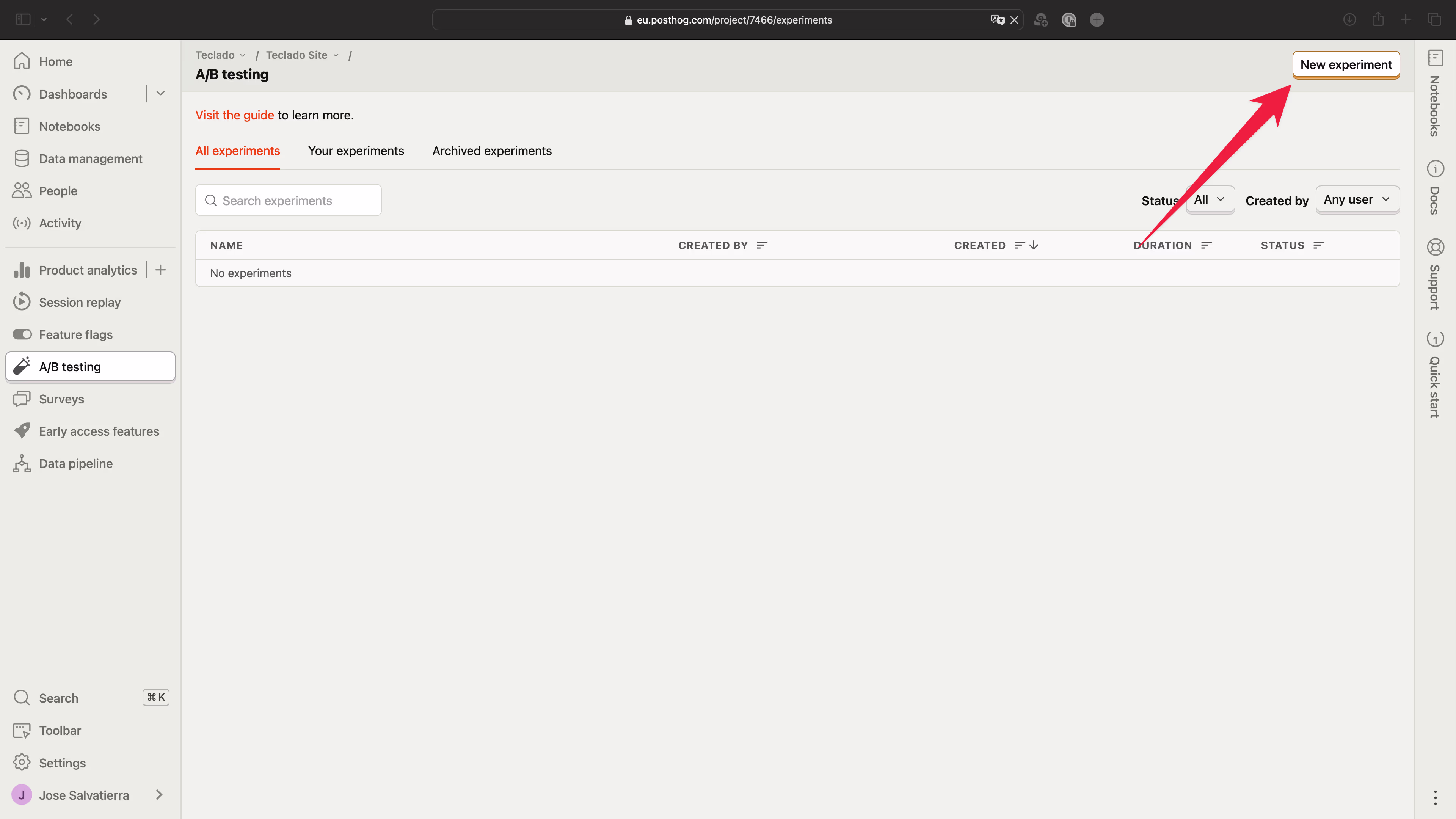 Screenshot showing the empty A/B tests section with an arrow pointing to 'New experiment'